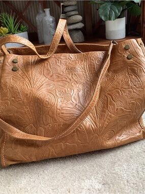 American Leather Co, tooled leather handbag.
